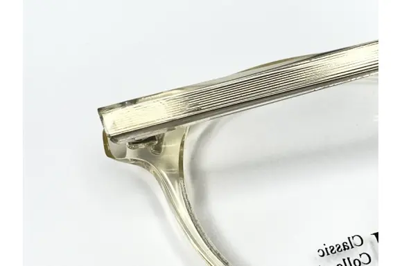テンプル内部芯金に汚れあり